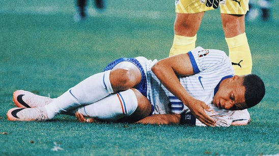 Kylian Mbappé suffers bloodied face, misses simple chance, but France beats Austria