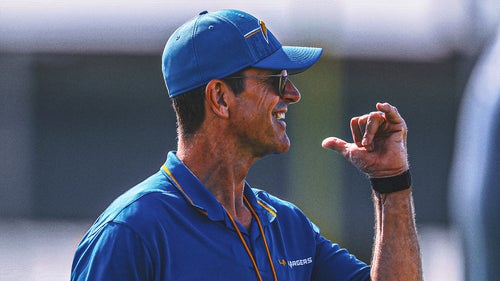 MICHIGAN WOLVERINES Trending Image: Los Angeles Chargers coach Jim Harbaugh equates first day of training camp to 'being born'