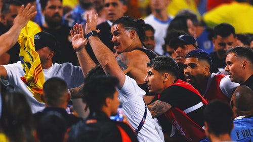 COPA AMERICA Trending Image: Copa América: Uruguay players fight fans in stands after 1-0 loss to Colombia