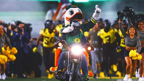 OREGON DUCKS Trending Image: Here come the Ducks! Large inflatable of Oregon's mascot placed in Indy river
