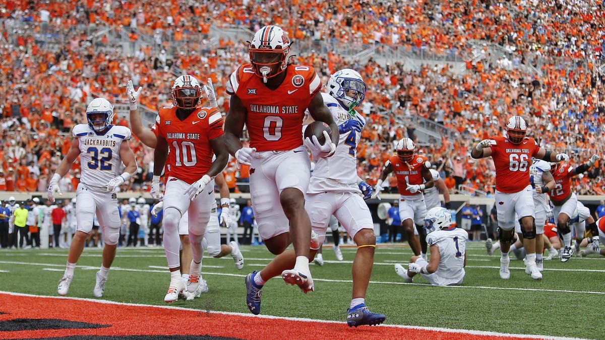 Oklahoma State running back Ollie Gordon II has rushed for 216 yards and four touchdowns through the Cowboys' first three games. (Photo by Brian Bahr/Getty Images)
