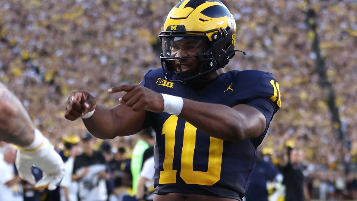 Michigan QB Alex Orji is set to get his first collegiate start when the Wolverines host USC on Sept. 21. (Photo by Gregory Shamus/Getty Images)