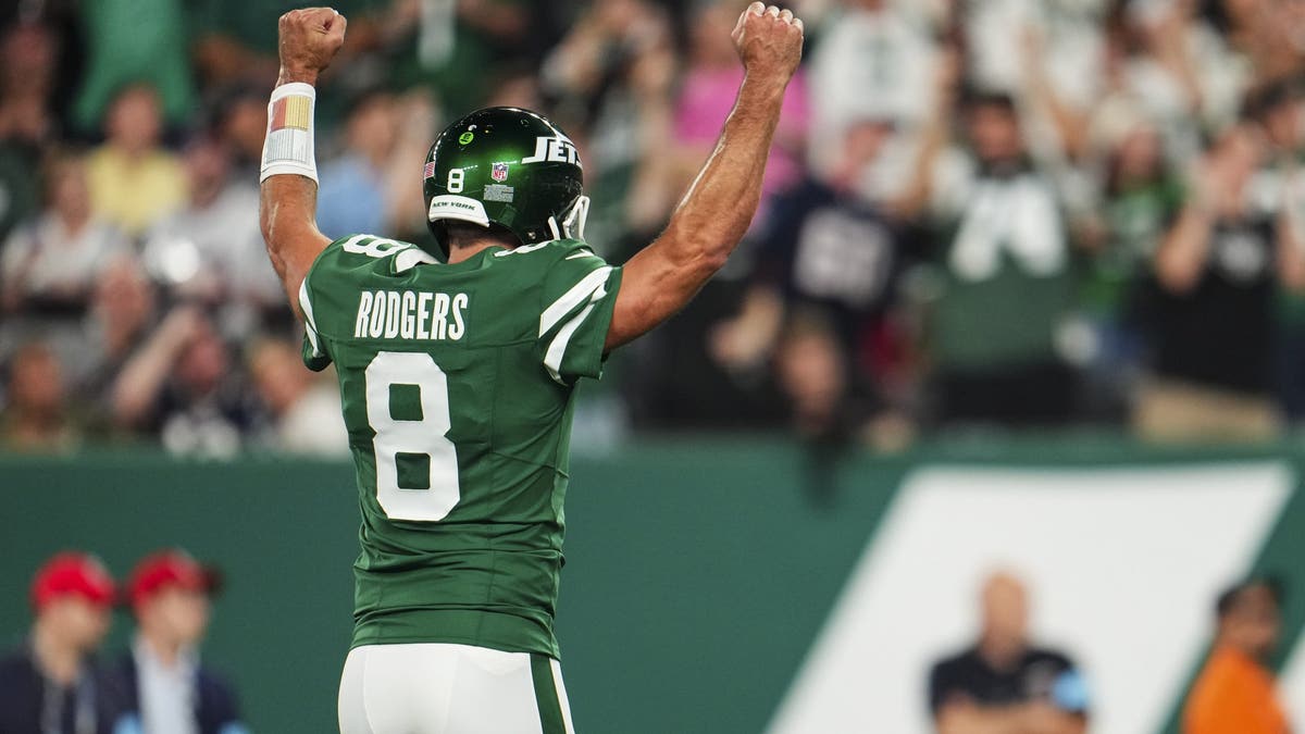 Aaron Rodgers showed shades of his former self against the Patriots in Week 3. (Photo by Cooper Neill/Getty Images)