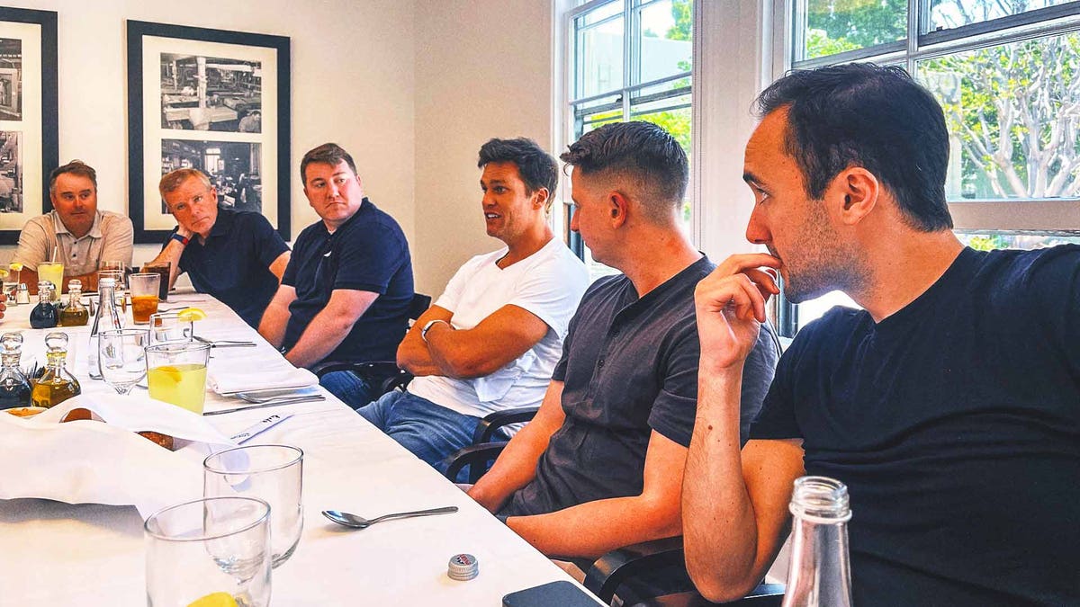 Tom Brady meets with the production crew during a lunch meeting in Los Angeles in June. (Photo by Richie Zyontz)