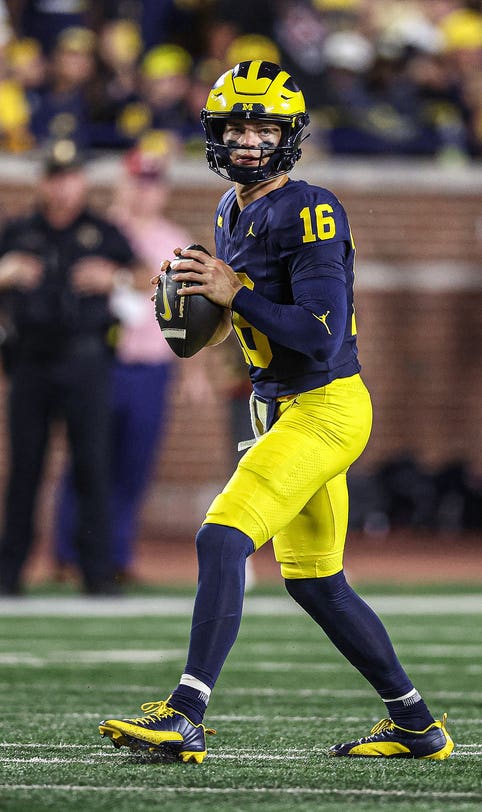 Michigan reportedly going back to Davis Warren as starting QB