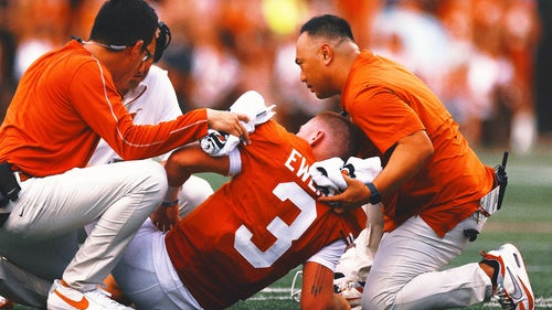 COLLEGE FOOTBALL Trending Image: Quinn Ewers leaves Texas vs. UTSA with abdominal injury, Arch Manning takes over