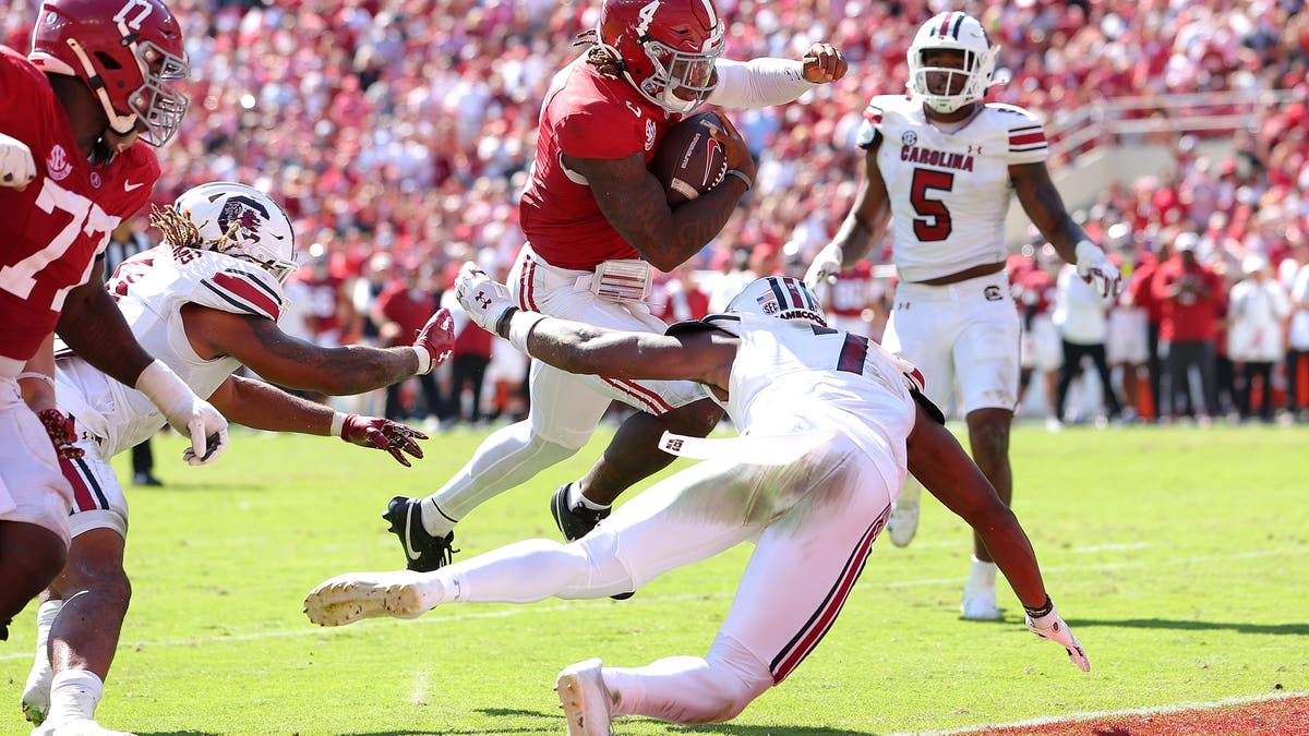 Alabama's Jalen Milroe has been one of the best dual-threat quarterbacks in the nation, scoring 23 total touchdowns this season. (Photo by Kevin C. Cox/Getty Images)