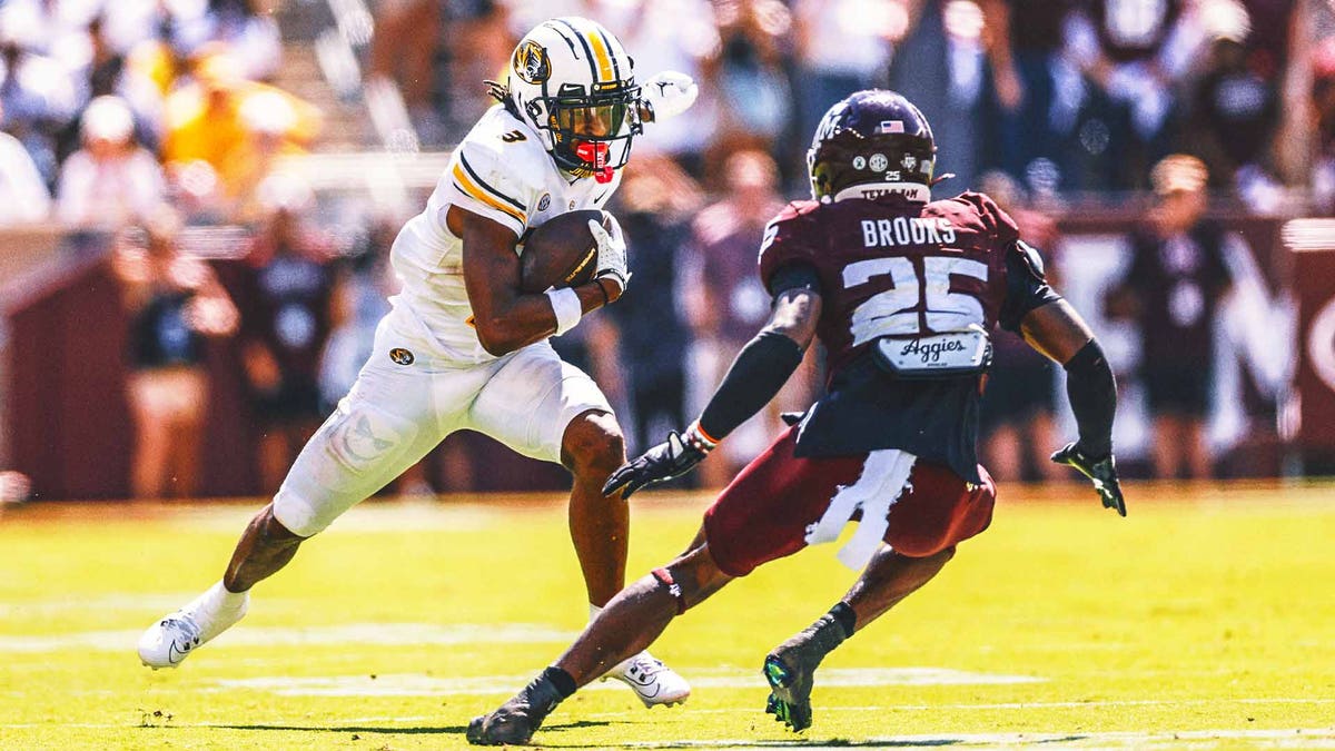 At a power-packed 5-11, 210 pounds, Luther Burden III is a lot for opposing defenses to handle. (Photo by Tim Warner/Getty Images)