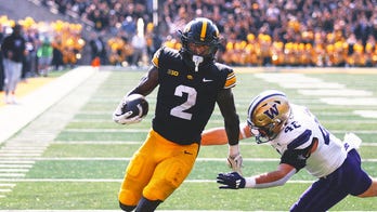 Kaleb Johnson's three touchdowns lifts Iowa over Washington, 40-16