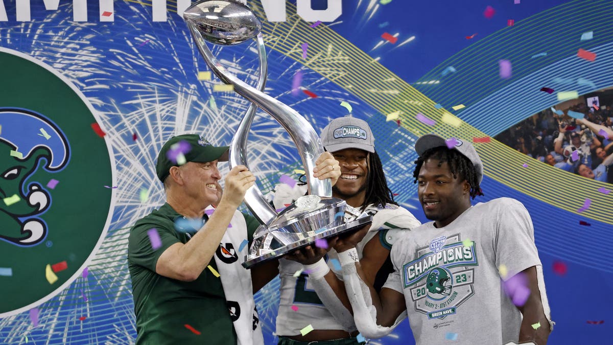 Tulane celebrated an upset win over USC in the Cotton Bowl as part of its turnaround year in 2022. (Photo by Ron Jenkins/Getty Images)