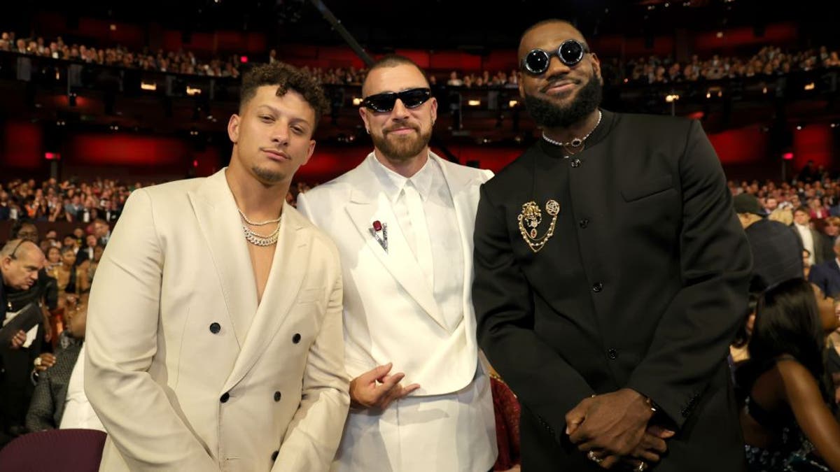 Mahomes and Travis Kelce posed with LeBron James at the 2023 ESPY Awards. Do you see any villains? (Photo by Kevin Mazur/Getty Images)