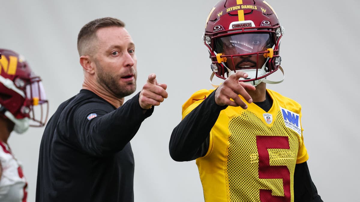 Commanders OC Kliff Kingsbury has helped rookie QB Jayden Daniels get off to a great start in his NFL career. (Photo by Scott Taetsch/Getty Images)