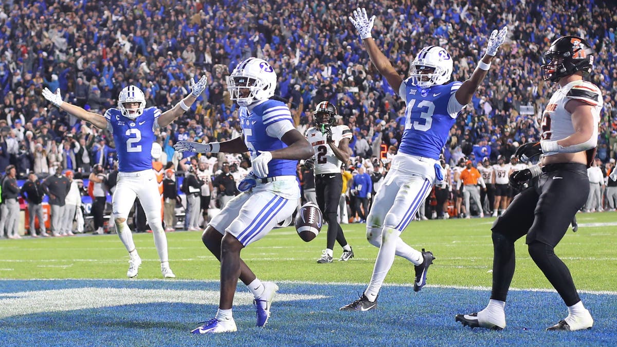 Wide receivers Darius Lassiter (No. 5) along with Chase Roberts (No. 2) and Jojo Phillips (No. 13) have helped BYU get off to a 9-0 start. (Photo by Chris Gardner/Getty Images)