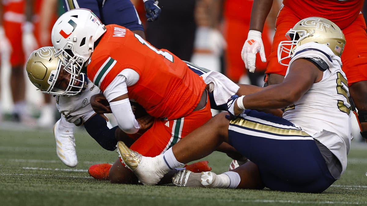 Miami QB Cam Ward has been stellar for the majority of the season, leading the nation in passing yards and touchdowns. (Photo by Todd Kirkland/Getty Images)