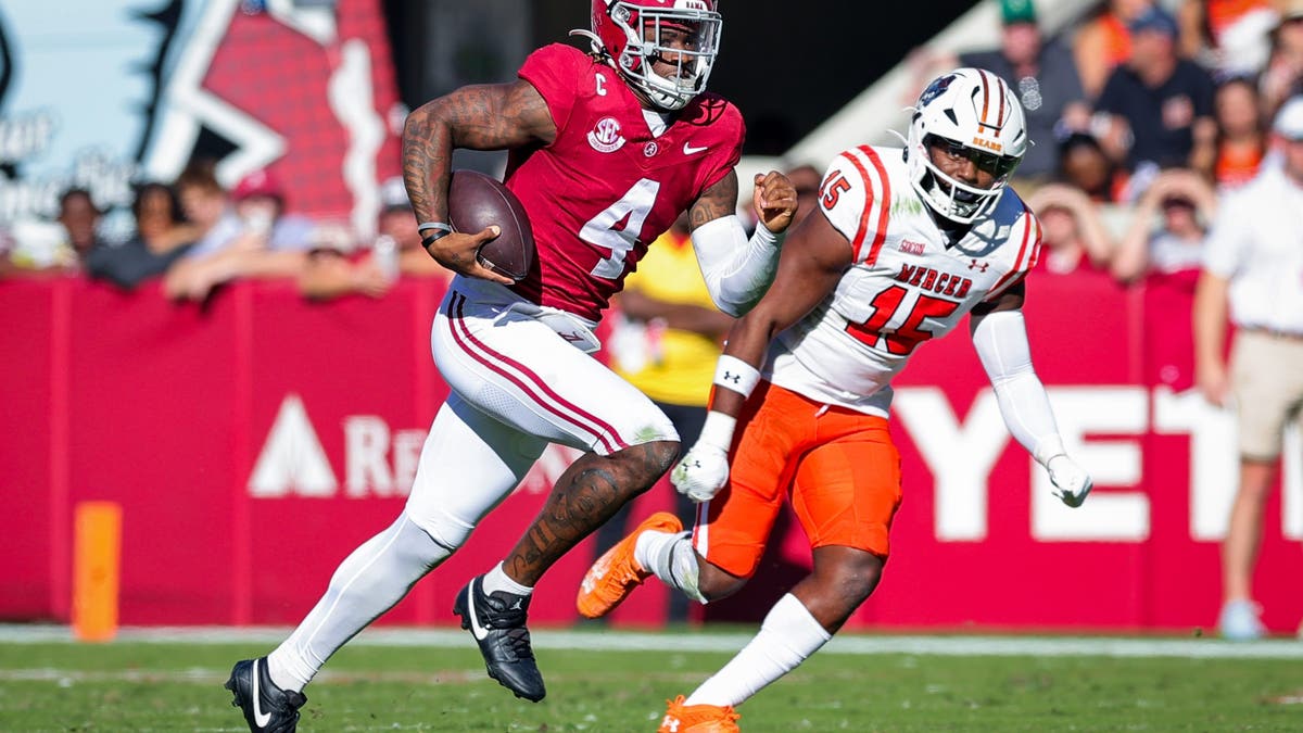 Alabama QB Jalen Milroe has thrown for 2,232 yards and rushed for 608 yards through 10 games this year. (Photo by Brandon Sumrall/Getty Images)