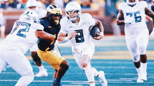 NEXT Trending Image: Heisman hopeful Dillon Gabriel leads No. 1 Oregon to 38-17 win over Michigan