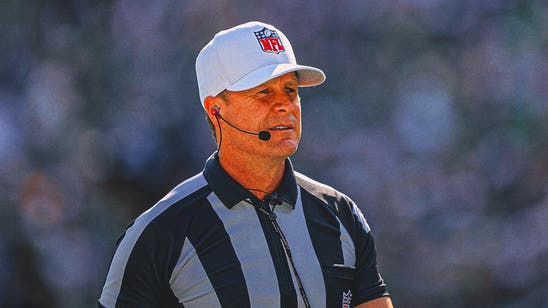 Shawn Hochuli announces penalty in German during NFL game in Munich
