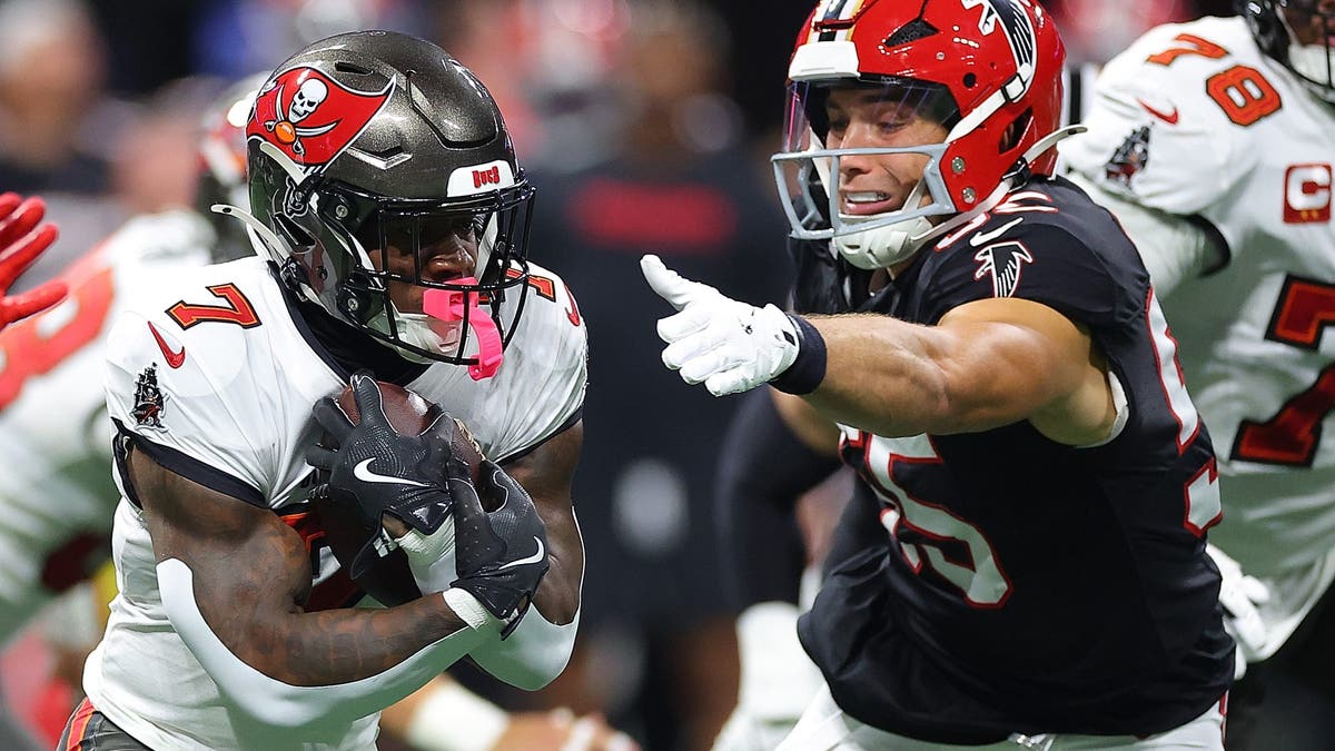 The refs missed a facemask against Bucky Irving in Tampa Bay's Week 5 loss to Atlanta. (Photo by Kevin C. Cox/Getty Images)