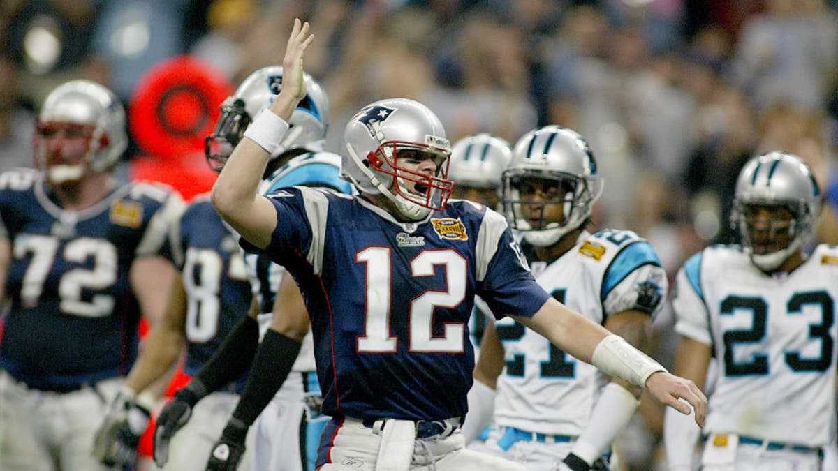 Tom Brady led the Patriots to their second title, and the start of a two-peat, with a 32–29 win over the Panthers in Super Bowl XXXVIII. (Photo by Matthew West/MediaNews Group/Boston Herald via Getty Images)