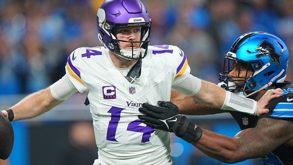 Sam Darnold was under duress for much of the Vikings' loss to the Lions, completing just 18 of 41 passes. (Photo by Erick W. Rasco/Sports Illustrated via Getty Images)