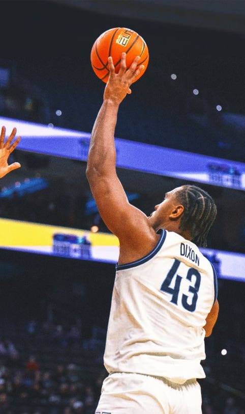 Eric Dixon scores 23 points to lead Villanova over No. 16 Marquette 81-66