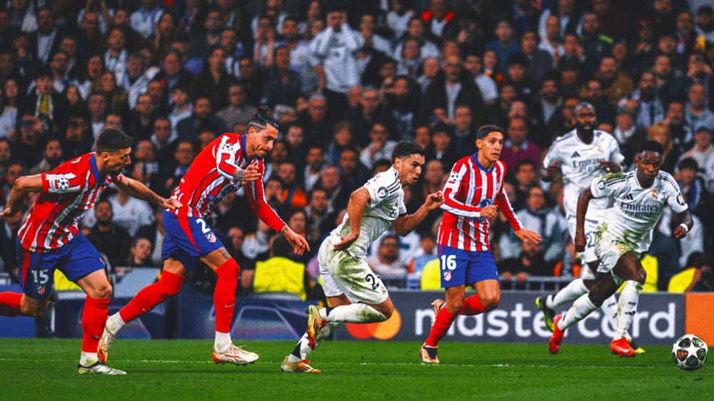 Real Madrid beats Atletico 2-1 in Champions League derby, Arsenal romps PSV