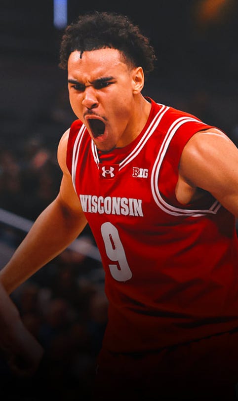 No. 18 Wisconsin tops No. 7 Michigan State in Big Ten semis after controversial no-call