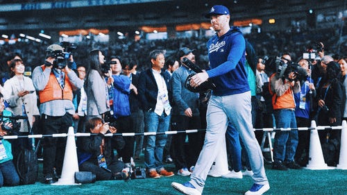 NEXT Trending Image: Dodgers star Freddie Freeman scratched from opening day lineup with left rib discomfort