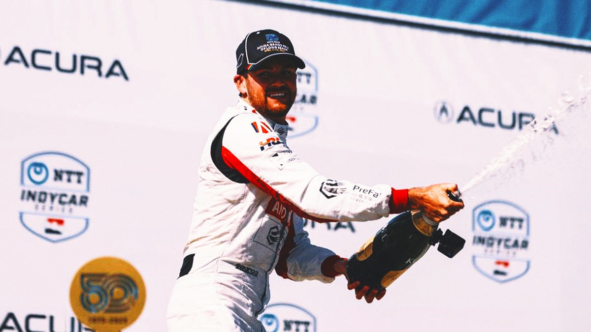 Kyle Kirkwood celebrates after winning Long Beach Grand Prix