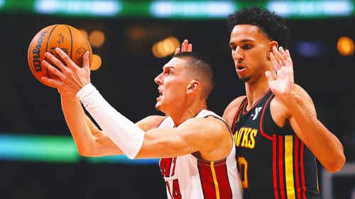 NBA Trending Image: Heat beat Hawks in OT, become first No. 10 seed to advance to NBA playoffs