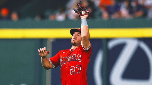 Fan snatches foul ball out of Mike Trout's glove — then meets him