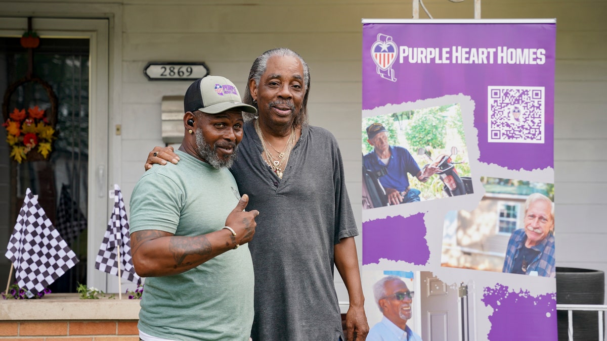Donald Covington (right) was one of the four veterans who had his home repaired through FOX Sports and Purple Heart Homes' initiative.?