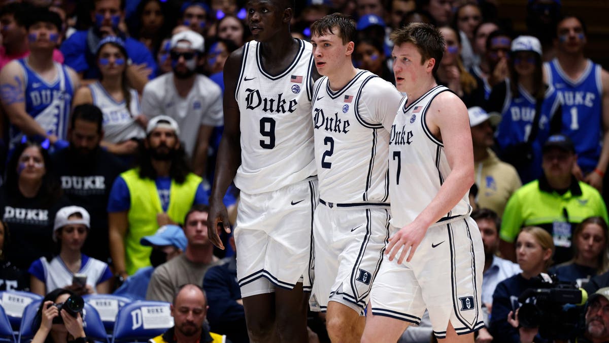 Cooper Flagg, center, is flanked by fellow top-10 prospects Khaman Maluach and Kon Knueppel. (Photo by Lance King/Getty Images)