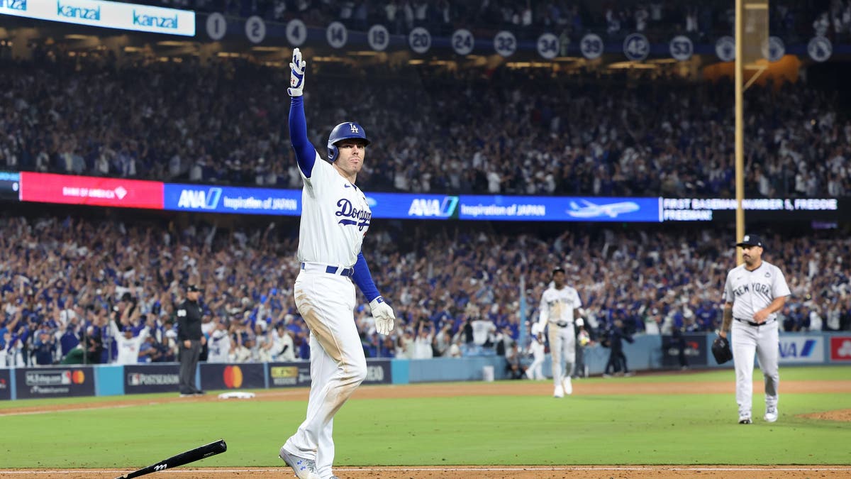 Freddie Freeman hits a walk-off grand slam against the Yankees in Game 1 of the World Series at Dodgers Stadium. (Wally Skalij/Los Angeles Times via Getty Images)