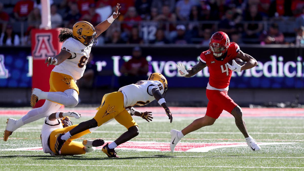 Tetairoa McMillan led the nation with 1,319 receiving yards last season, earning All-America honors. (Photo by Christopher Hook/Icon Sportswire via Getty Images)