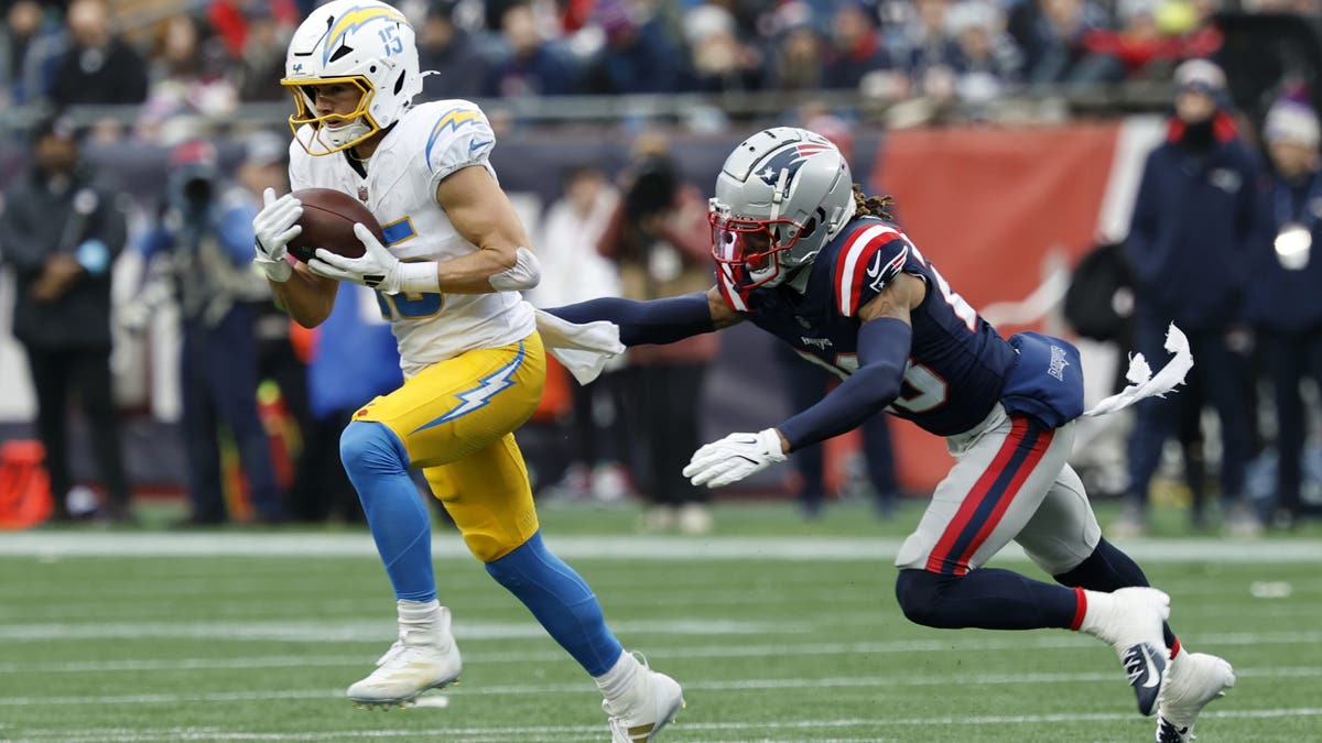 Los Angeles Chargers wide receiver Ladd McConkey (15) grabs a pass during a game between the New England Patriots and the Los Angeles Chargers on December 28, 2024, at Gillette Stadium in Foxborough, Massachusetts. (Photo by Fred Kfoury III/Icon Sportswire via Getty Images)