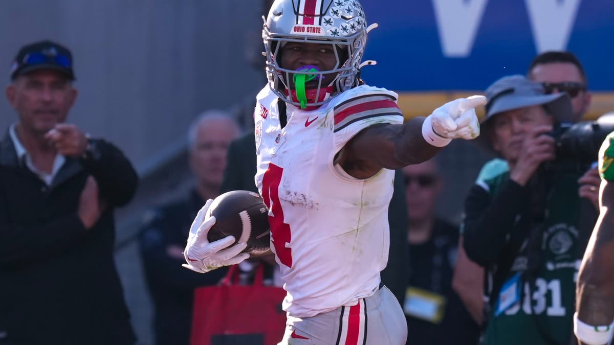 Jeremiah Smith #4 of the Ohio State Buckeyes celebrates a touchdown during a game between Ohio State and Oregon. (Photo by Melinda Meijer/ISI Photos/Getty Images)