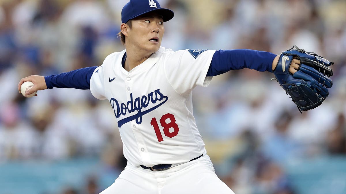 Yoshinobu Yamamoto is the only healthy starter on the Dodgers roster with an ERA under 4.00. (Photo by Ronald Martinez/Getty Images)