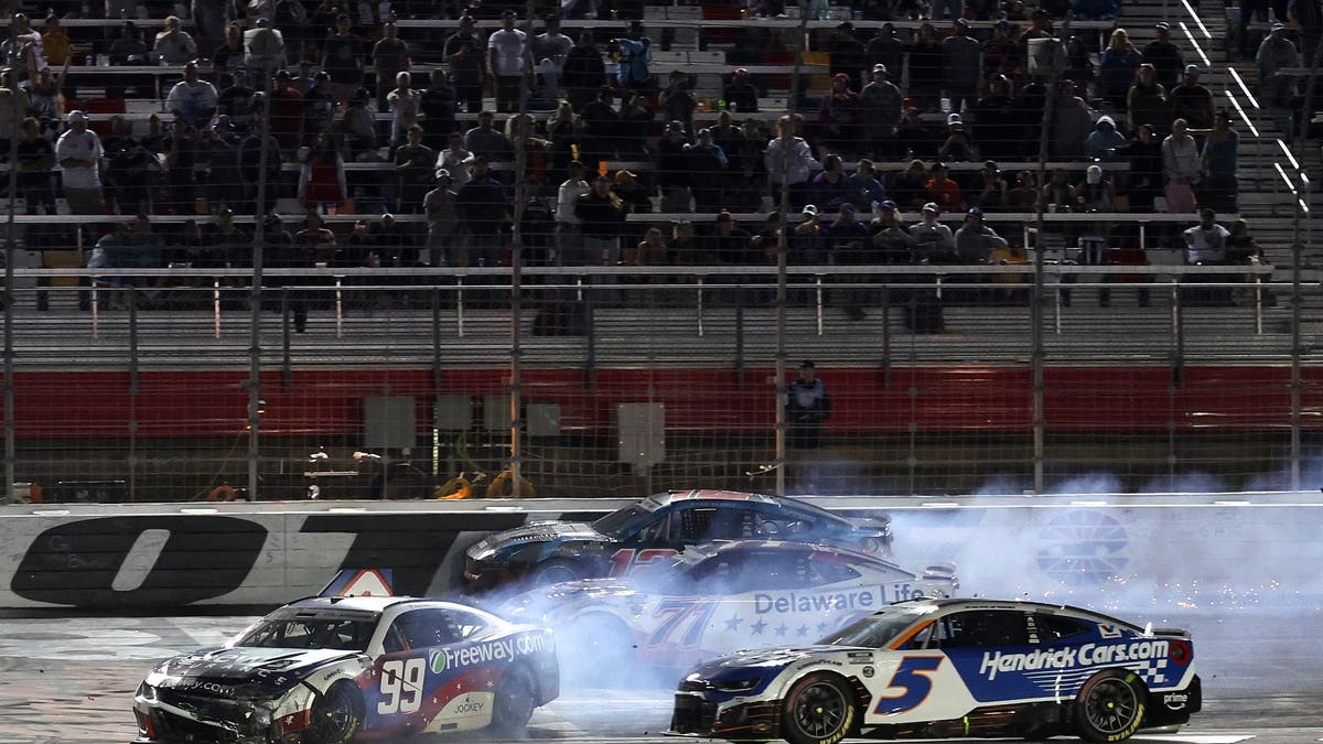 Kyle Larson gets caught in a wreck during the Coca-Cola 600 at Charlotte Motor Speedway. (Photo by David Jensen/Getty Images)