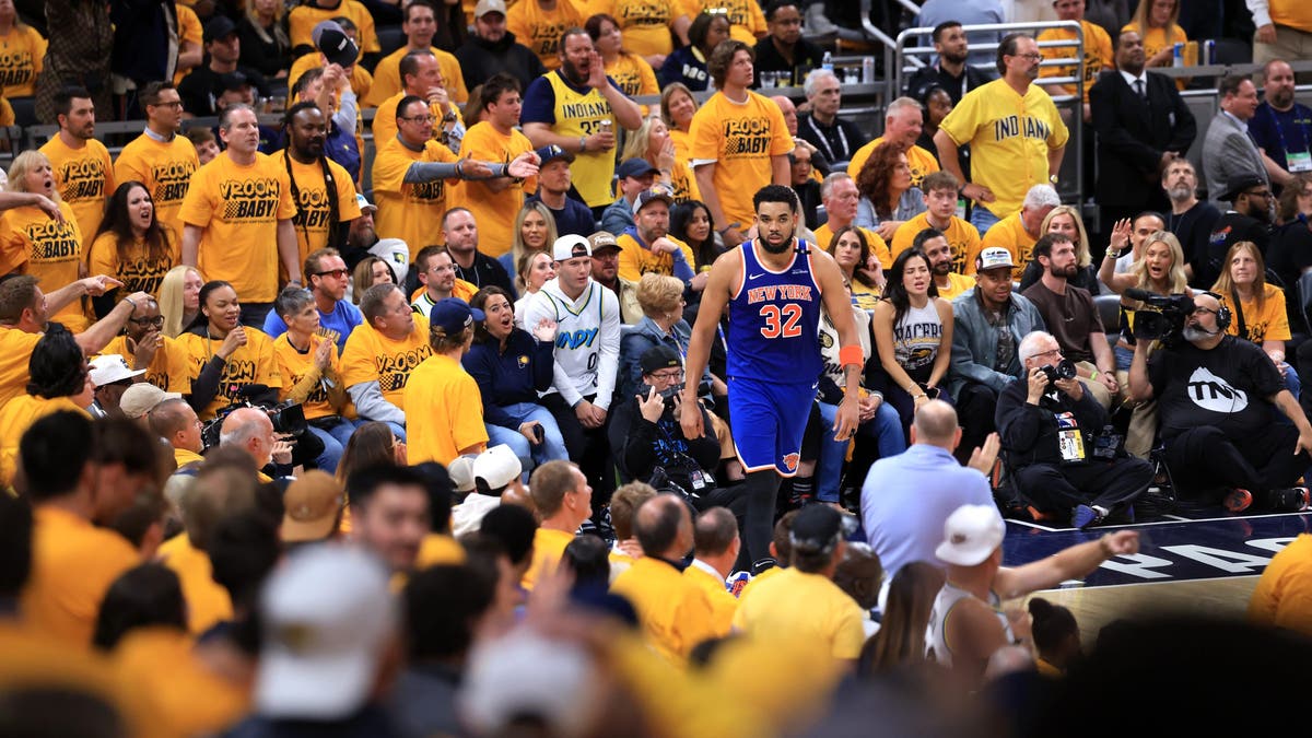 Karl-Anthony Towns reacts after dunking the ball against Andrew Nembhard and Myles Turner of the Indiana Pacers during the fourth quarter in Game 3 of the Eastern Conference Finals. (Photo by Justin Casterline/Getty Images)
