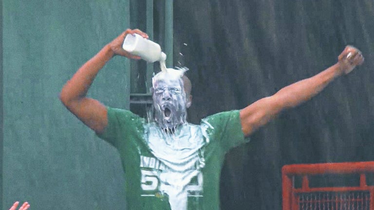 Indy 500 fever? Baseball fans are pouring milk on themselves to