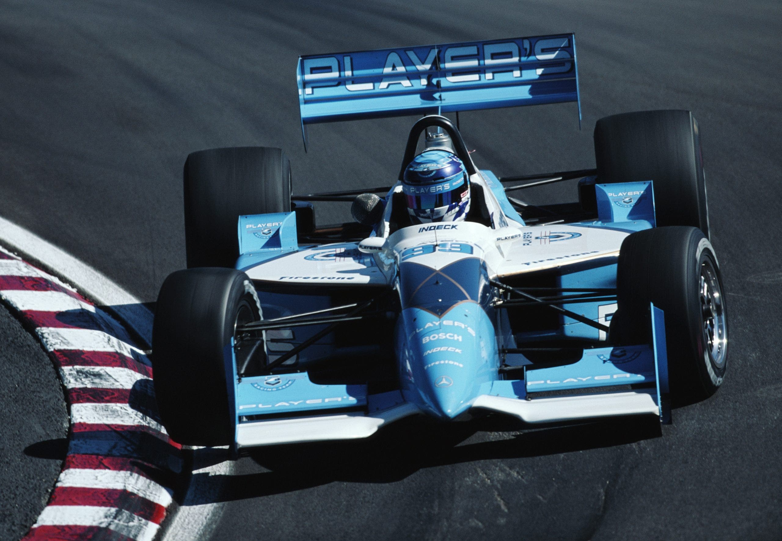 Greg Moore drives the Forsythe Racing Player's car in 1996.