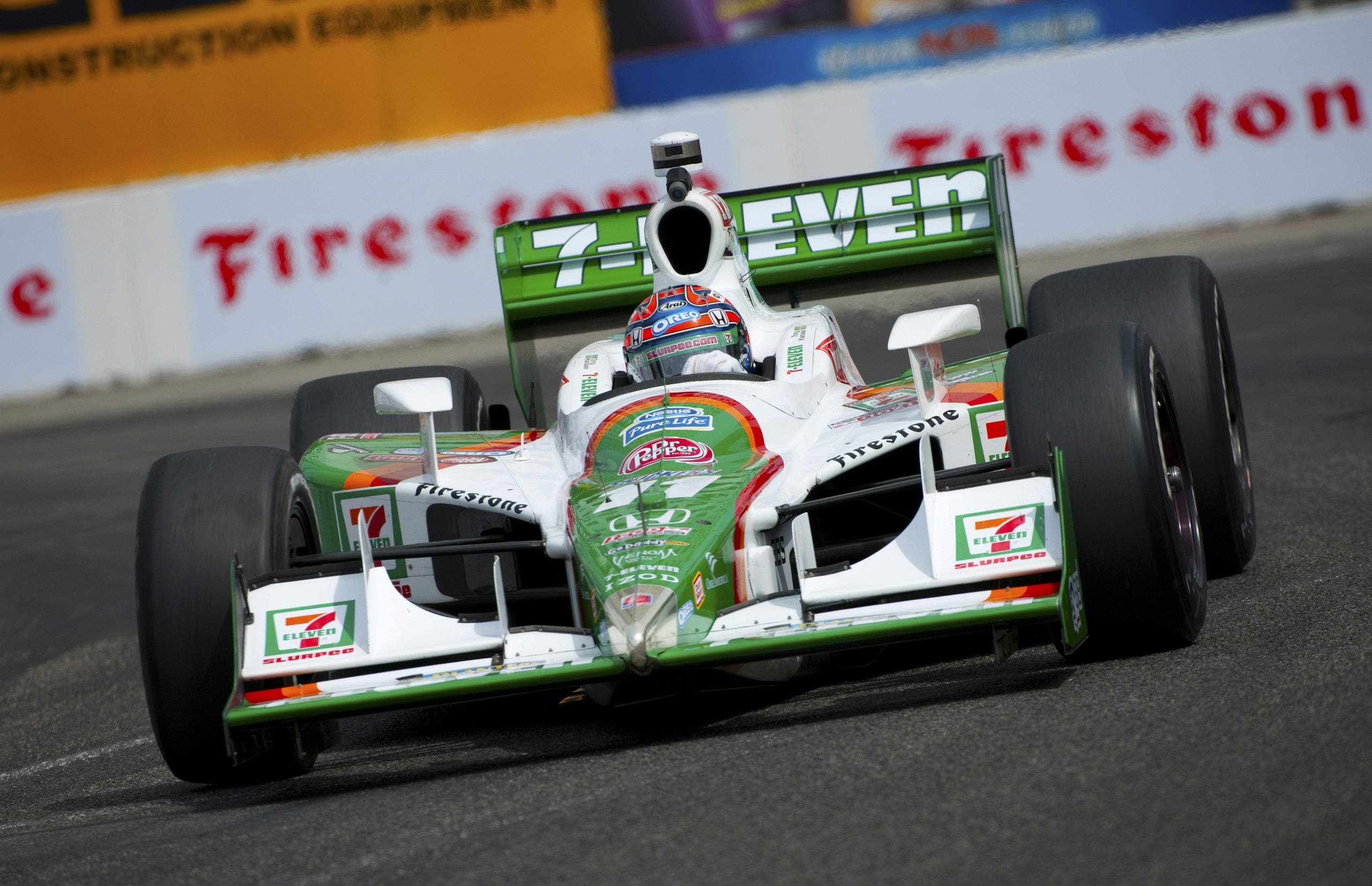 Tony Kanaan drives the Team 7-Eleven Dallara car in 2010.