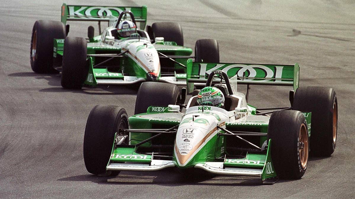 Paul Tracy (front) and Dario Franchitti drive the Team KOOL Green car in 2000.