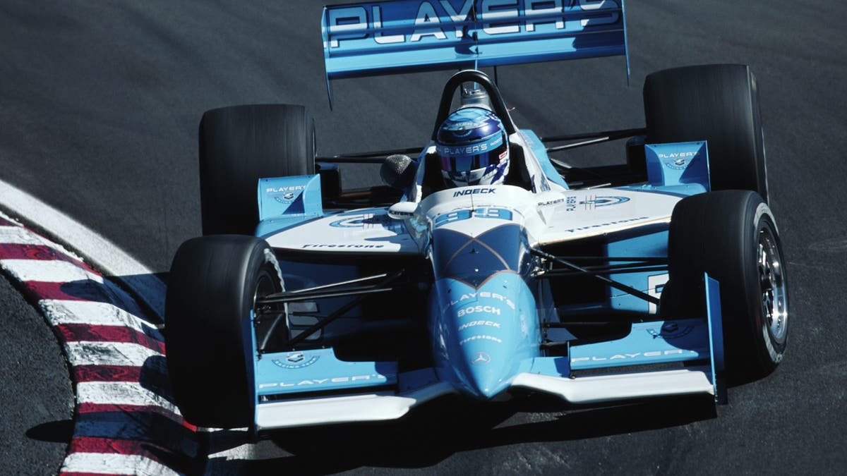 Greg Moore drives the Forsythe Racing Player's car in 1996.