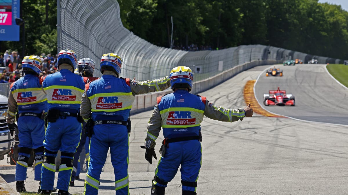 Emergency crews give a thumbs up to Marcus Ericsson going into Turn 5 before the start of the 2022 Grand Prix at Road America?