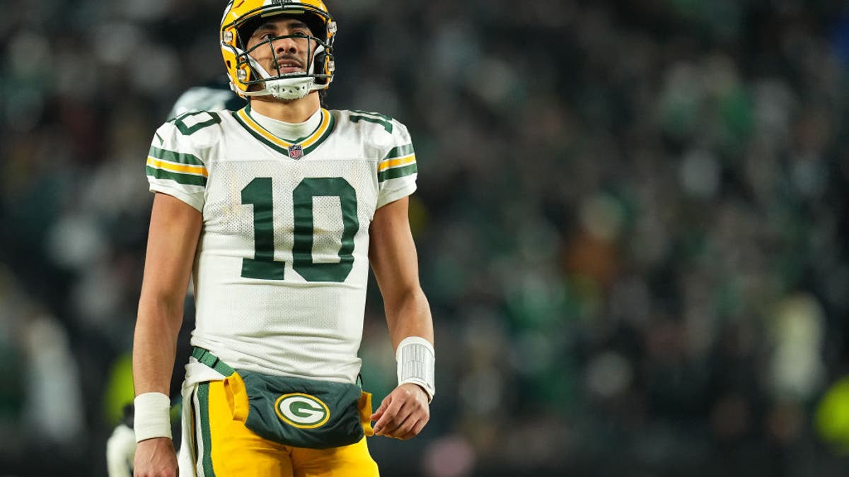 Jordan Love #10 of the Green Bay Packers reacts after a holding penalty in the fourth quarter of a game against the Philadelphia Eagles during the NFC Wild Card Playoff at Lincoln Financial Field on January 12, 2025 in Philadelphia, Pennsylvania. (Photo by Mitchell Leff/Getty Images)