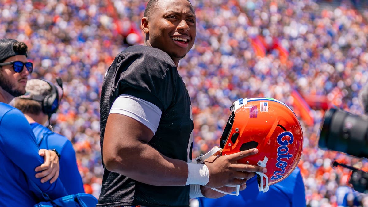 Florida quarterback DJ Lagway (2) smiles on the sideline during the Florida Gators Orange and Blue Game. (Photo by Chris Leduc/Icon Sportswire via Getty Images)