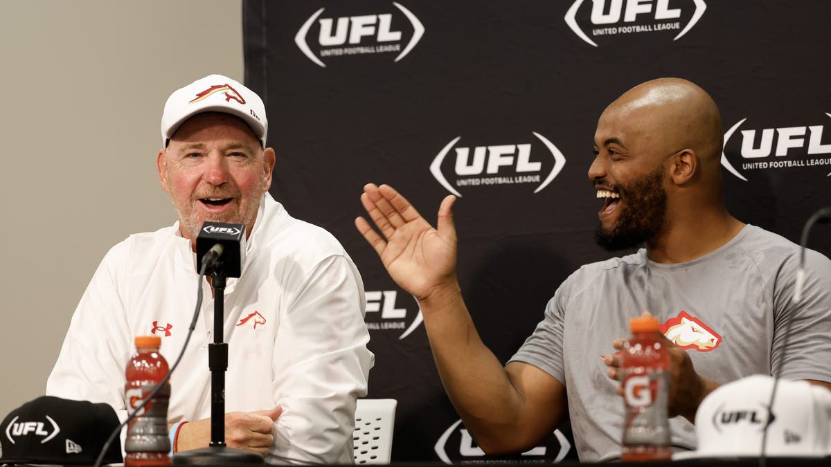 Skip Holtz and J'Mar Smith #1 of the Birmingham Stallions talk to the media after a 33-25 victory against the Houston Roughnecks. (Photo by Butch Dill/UFL/Getty Images)
