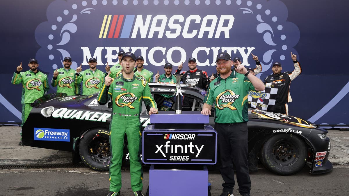 Daniel Suarez and crew celebrate in victory lane after winning the NASCAR Xfinity Series The Chilango 150 at Autodromo Hermanos Rodriguez